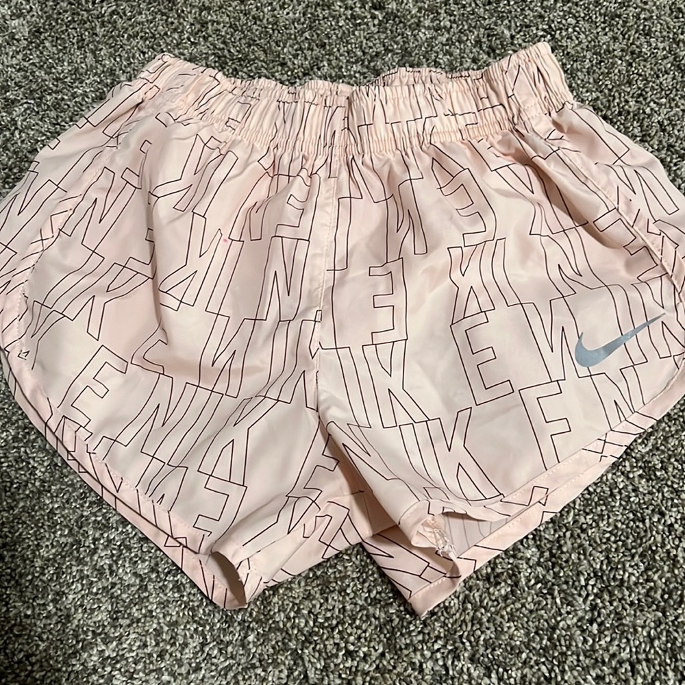 Light pink Nike shorts